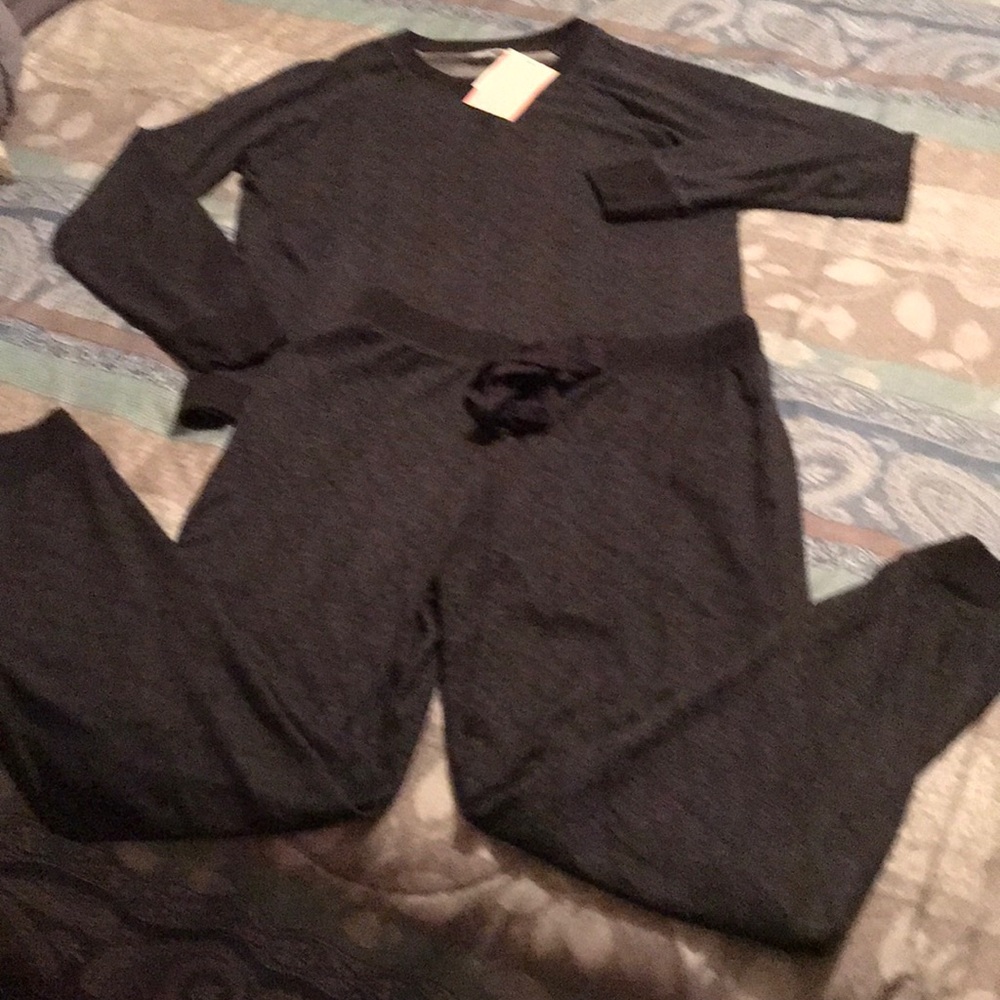 Never worn sweat suit!!
